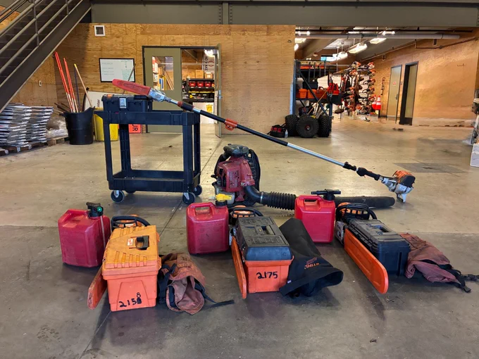 Some gas tanks and wood cutting/sawing equipment. 