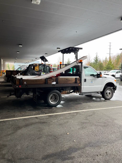 A City of Bothell Public Works truck with some barricades in the back. 
