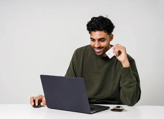 Photo by Sora Shimazaki from Pexels: https://www.pexels.com/photo/man-holding-his-credit-card-5935744/