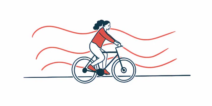 Illustration of a person riding a bicycle.