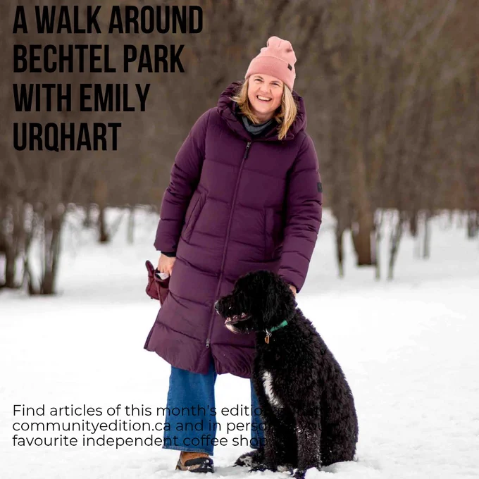 Emily Urqhart is standing with her dog 