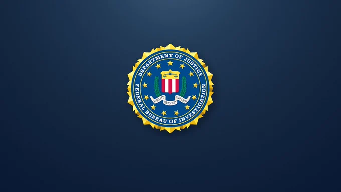 FBI seal on a dark blue background. 