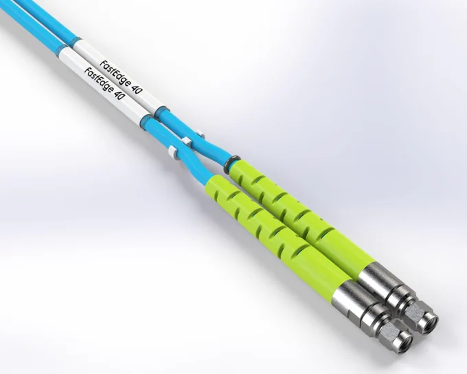 A close-up image of two FastEdge blue and green cables with connectors.
