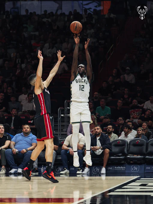 A photo of Taurean Prince shooting a corner three.