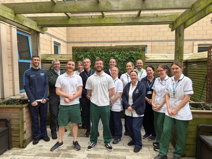 Stroke Therapy team in the courtyard of the therapy garden at RLI.