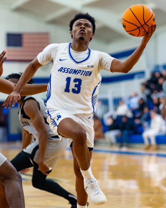 A student-athlete on the AU Men's Basketball team with the ball during a game in January.