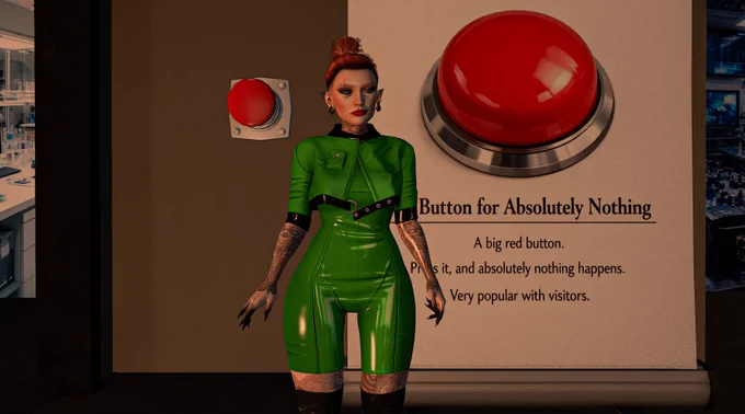 A Second Life avatar wearing a shiny green outfit stands beside an exhibit called “Button for Absolutely Nothing,” featuring a large red button and a sign explaining that pressing it does absolutely nothing.