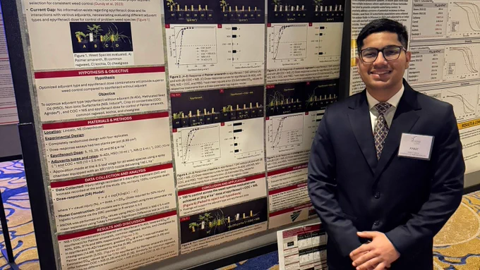 Ankit Yadav, an agronomy and horticulture doctoral student, presents his poster on Rapidicil® at the 2026 Weed Science Society of America meeting.
