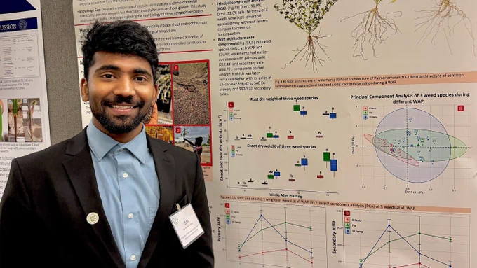 Sai Suvidh Madela, an agronomy and horticulture doctoral student, presents one of his posters on root biology of herbicide-resistant weeds, Palmer amaranth, waterhemp and common lambsquarters at the 2026 Weed Science Society of America meeting.