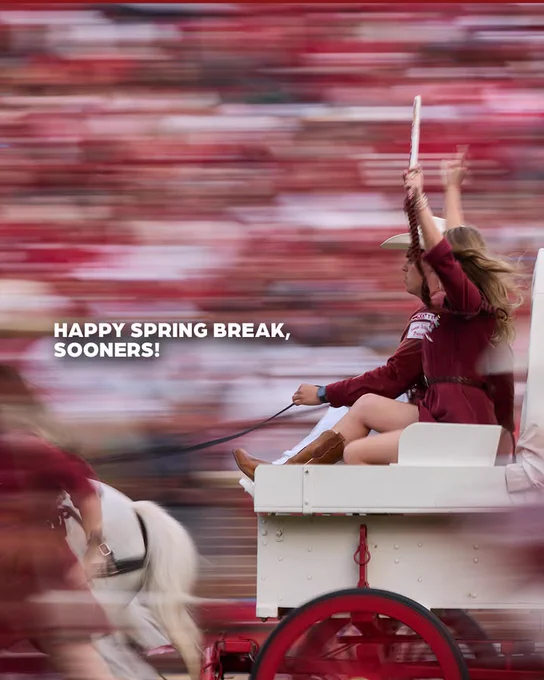 A pair of OU RUF/NEKs ride a pony-drawn schooner. The words "Happy Spring Break, Sooners!" are written in white text. The background features a motion-blurred crowd dressed in red.