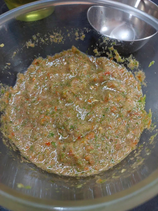 https://x.com/NoFireCooking/status/2032734424631226378 
The post from @NoFireCooking -  shares a simple #NoFireCooking recipe for a raw tomato chutney that works as a dip for veggies like cucumber and carrot, or as a spread over sprouts. It lists the ingredients: tomatoes, green chilies, coriander leaves (cilantro), garlic pods, pink salt, and lemon juice—no cooking required, which keeps it fresh and nutrient-packed.Based on the image you shared (which matches one from the post), it looks like a straightforward setup for blending everything into a vibrant, spicy-sour chutney. I dig the no-fuss approach—it's quick, healthy, and perfect for hot days when you don't want to turn on the stove. If you're making it, I'd suggest roughly chopping 3-4 tomatoes, 2-3 green chilies (adjust for heat), a handful of cilantro, 3-4 garlic cloves, juice from 1 lemon, and a pinch of pink salt, then pulsing in a blender until chunky or smooth. Tastes like a desi version of pico de gallo! 