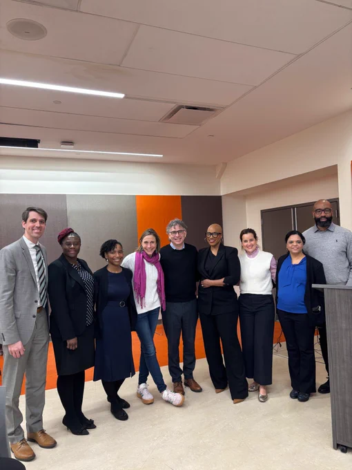 Rep. Ayanna Pressley poses for a photo with Massachusetts Community Engagement Alliance & Boston Medical Center leaders.