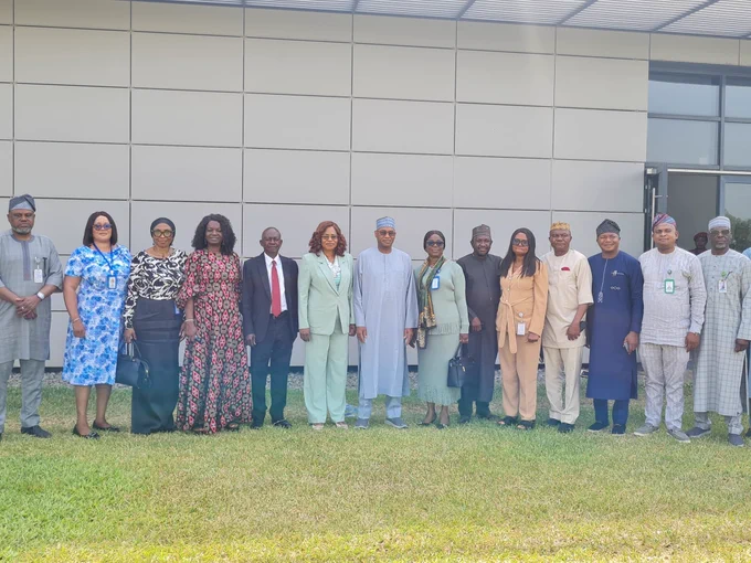 The Permanent Secretary, MPR. Mrs. Patience N. Oyekunle (6th left) flanked by the Executive Secretary of PTDF Mallam Ahmed Galadima Aminu (7th left) and the Directors and the management staff of both the Ministry of Petroleum Resources and Petroleum Trust Development Fund (PTDF) in a group photograph during the courtesy visit to PTDF Towers in Abuja.