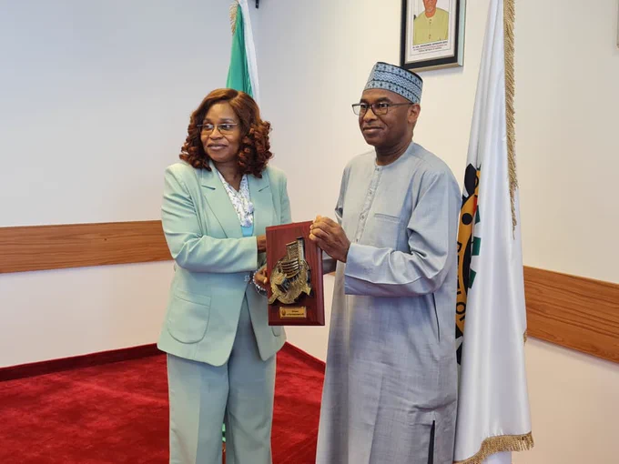 The Permanent Secretary, MPR. Mrs. Patience N. Oyekunle (left) receiving a souvenir from the Executive Secretary of PTDF, Mallam Ahmed Galadima Aminu (right) during the familiarization and courtesy visit to PTDF Towers, Abuja.