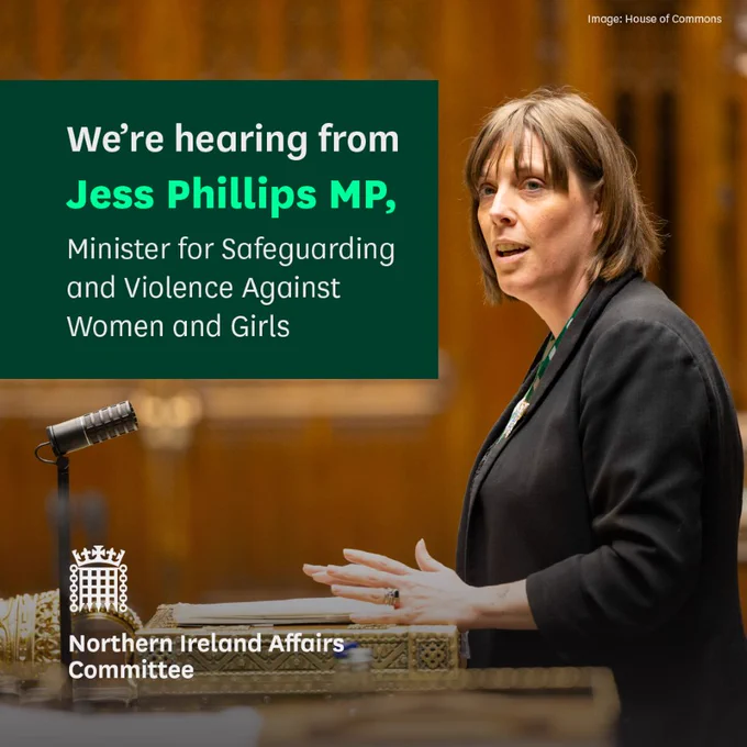 We're hearing from Jess Philips MP, Minister for Safeguarding and Violence Against Women and Girls.
Northern Ireland Affairs Committee.
Photo shows Jess Philips MP speaking from the Table of the House of Commons debating chamber, her hands are resting on the Despatch Box as she speaks in the chamber. She has shoulder length brown hair and is wearing a black jacket.