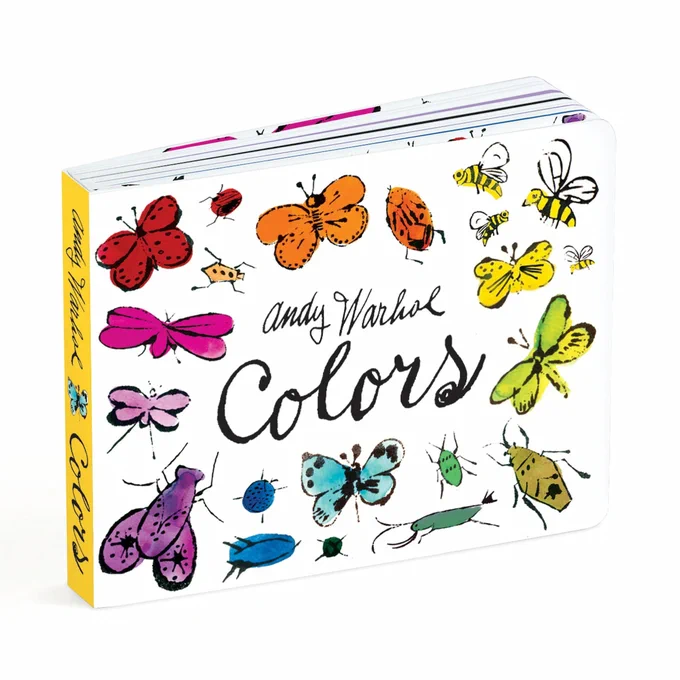 The image shows a book titled "Andy Warhol Colors." The cover features illustrations of colorful butterflies, bees, and other insects on a white background. The book has a yellow spine.