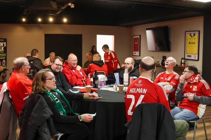 A group of DSA members sat in the hospitality lounge