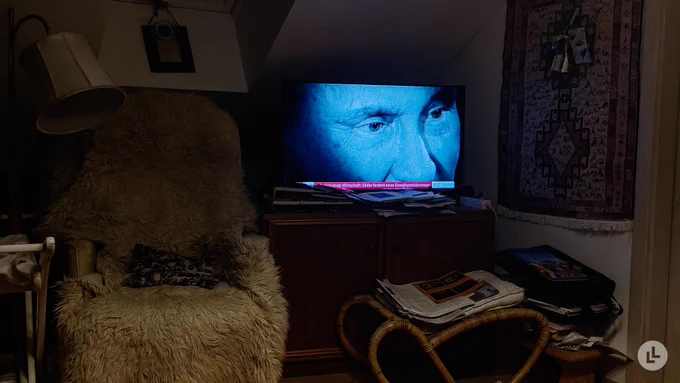 A Ukrainian television program featuring Zelensky is seen on a hotel’s television in Moldova.