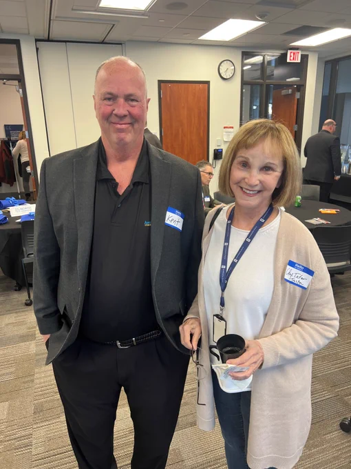 President Kent Hanson and Cheryl Tefer smiling at the camera. 