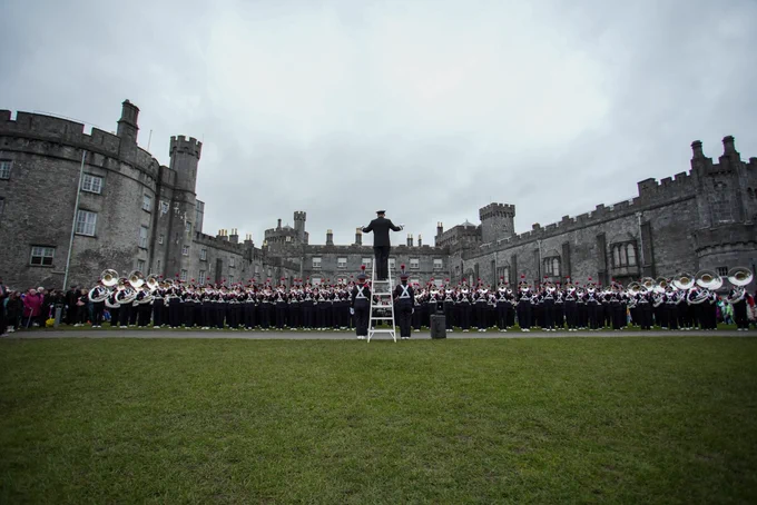 The Ohio State University Marching Band performing in front of Kilkenny Castle.