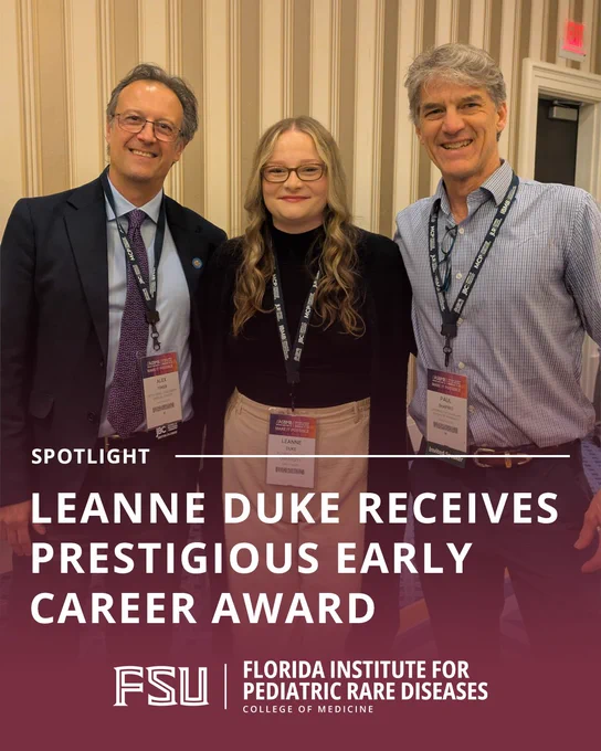 The central figure, Leanne Duke, is highlighted for receiving a "Prestigious Early Career Award." She is flanked by two colleagues, and all three are wearing ASBMB conference lanyards. The bottom of the image features the logo for the Florida Institute for Pediatric Rare Diseases.