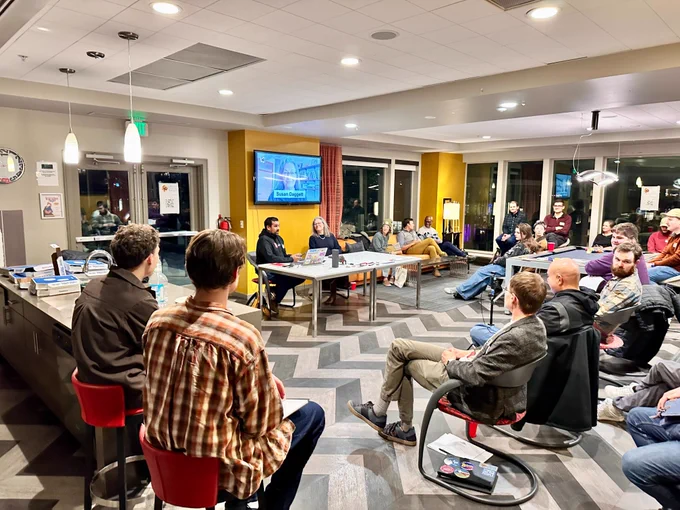 Greater Denver Transit meeting at Cadence with last month's guest Susan Daggett.