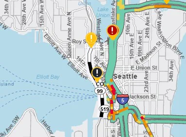 Map shows location of SR 99 Tunnel closure in downtown Seattle with a black exclamation point marker. Other yellow and red exclamation point markers for other events are on the map.