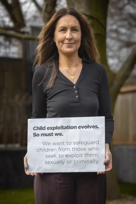 Detective Chief Inspector Claire Gilbert holding a sign which reads in bold font: "Child exploitation evolves. So must we." In normal font below it reads: "We want to safeguard children from those who seek to exploit them sexually or criminally."