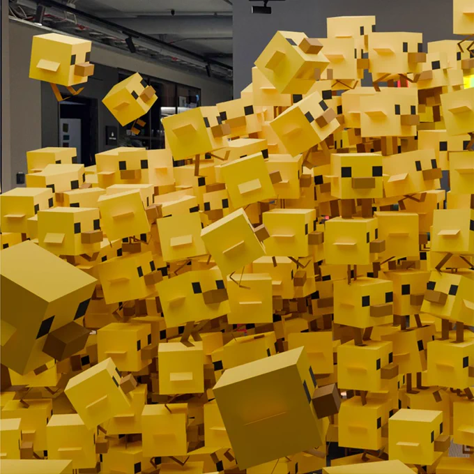 like.... a thousand baby chickens from Minecraft all conglomerated in a big group, almost like a wave, pushing to the right