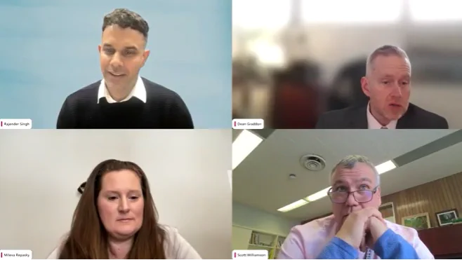 A screenshot of four speakers in a Zoom webinar