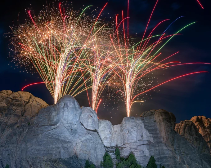Fireworks illuminate the sky above Mount Rushmore National Memorial.