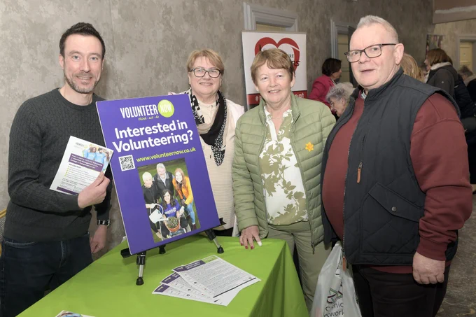 A group of people at one of the exhibition stands at the keep safe keep well events