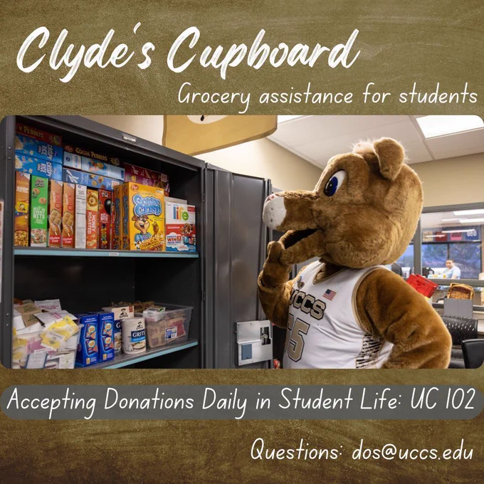 UCCS mascot Clyde stands in front of a cupboard filled with cereal boxes and food items. Text reads: “Clyde’s Cupboard – Grocery assistance for students. Accepting donations daily in Student Life: UC 102. Questions: dos@uccs.edu