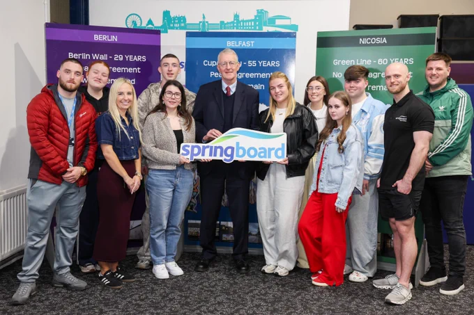 Secretary of State Hilary Benn with young people and staff from Springboard in Belfast.