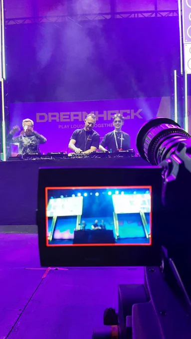 An image taken from behind one of the cameras at the main stage of Djinn, Haden and Moose doing their set.