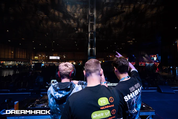 A picture from behind the decks where Djinn, Haden and Moose are interacting with the crowd.