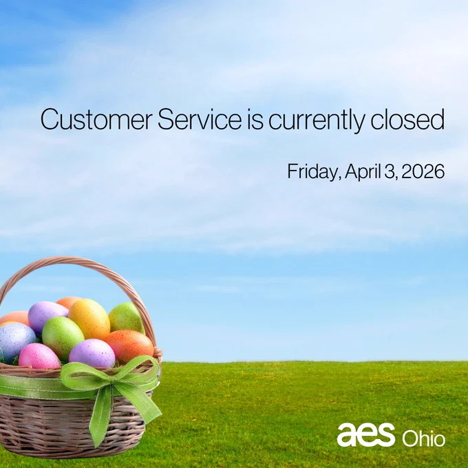 A wicker basket filled with colorful eggs sits in a grassy field on a sunny day. Text reads "Customer Service is currently closed Friday, April 3, 2026"