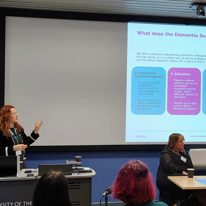 A person is giving a presentation on "What does the Dementia Support Team do?" at the University of the West of Scotland.