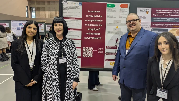 Minahel Qureshi, Jenna Ratcliffe, Dr. Mackenzie Salt, and Maryam Muayad stand with their poster titled, "Fraud Detection and Prevention Strategies for Online Surveys: Lessons Learned from the Brighter Path Project". A prominent main takeaway is featured on the poster, reading "Fraudulent survey activity can significantly compromise the integrity of online health survey research."