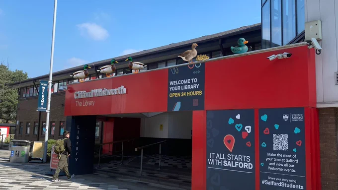 Image of the front of Clifford Whitworth with ducks on top of the roof