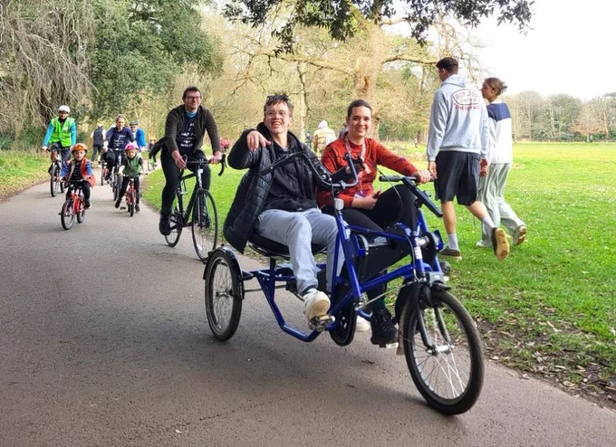 Having fun on a Pedal Power side-by-side cycle
