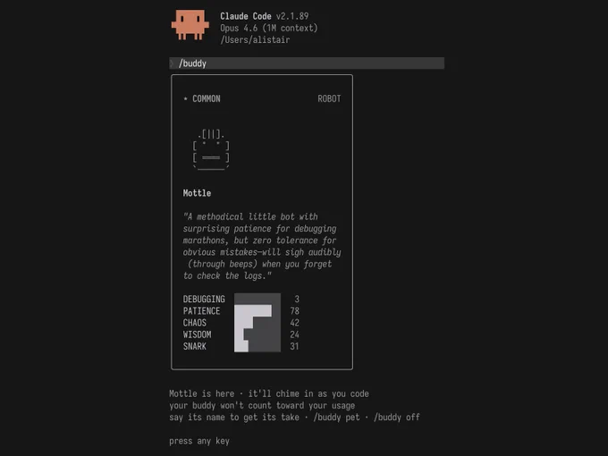 Screenshot of the Claude Code terminal interface presenting a trading card style unboxing of a buddy