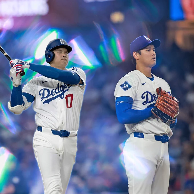 Two cutouts of Shohei Ohtani (one hitting and one preparing to pitch) in home white Dodgers uniforms with blue and red lettering. A blue glow is featured around Ohtani's hitting cutout. (Photo: Nicole Vasquez, Major League Baseball)