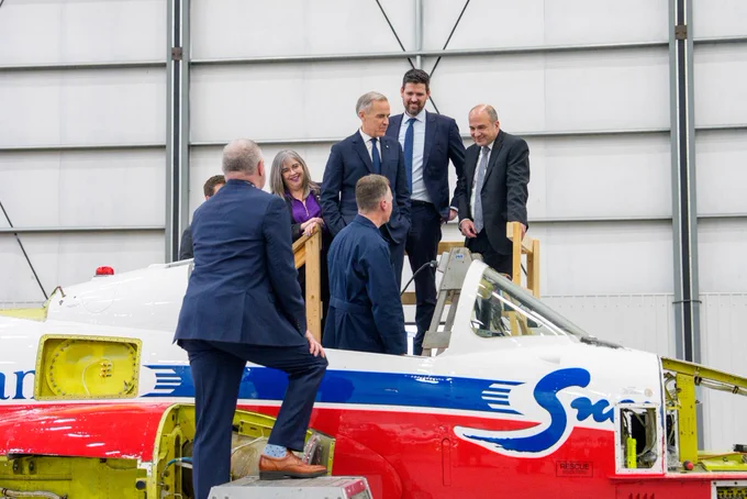 Prime Minister Carney visits an aerospace facility in Enfield, Nova Scotia.