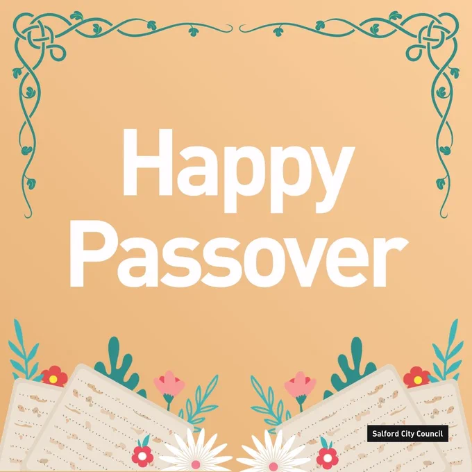 An illustration with a peach background featuring decorative green flourishes at the top. Large white text in the center reads “Happy Passover.” At the bottom, pieces of matzah are arranged among colorful flowers and leaves. A small black logo in the lower right corner says “Salford City Council.”