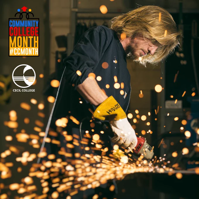 Welder at Cecil college working with metal grinder.