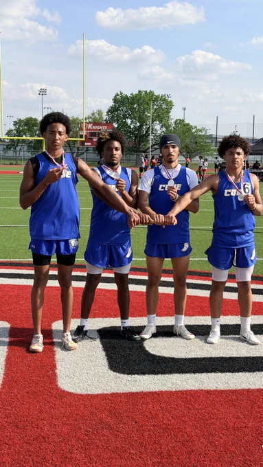 9th grade 4x100m relay team celebrating their 2nd place finish!