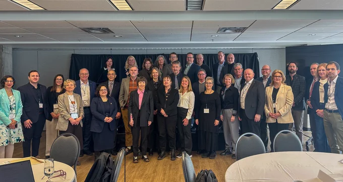 Group shot of delegation and Carleton representatives.