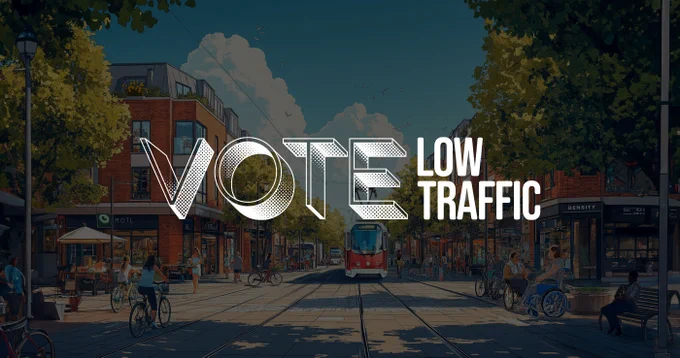 Cartoon streetscape scene faded in the background. 'Vote Low Traffic' logo overwritten
