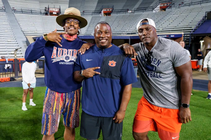 Photo of Cam Newton, Jeris McIntyre, and Takeo Spikes at Jordan-Hare Stadium during Auburn Football Spring Practice